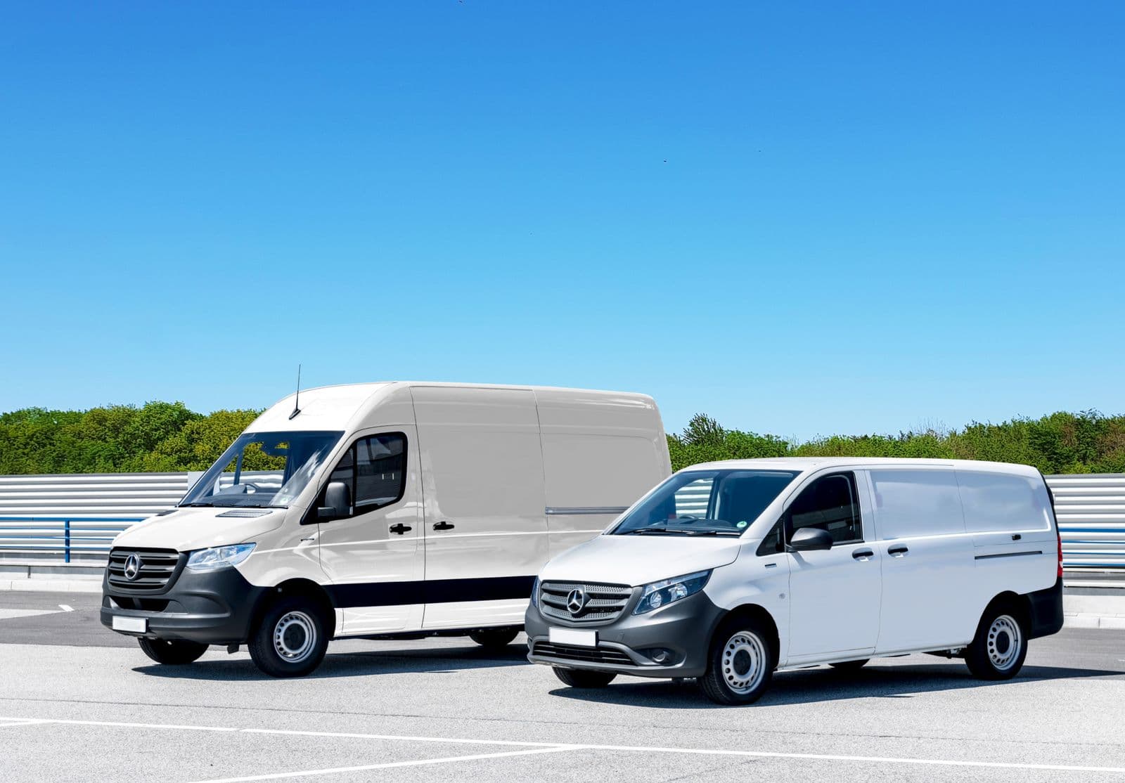 White vans in a car park